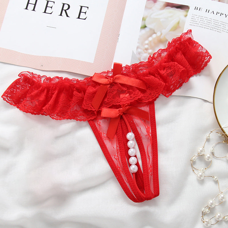 Lace crotchless thong