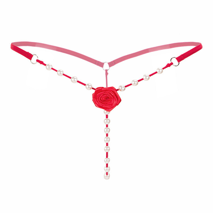 Low-rise crotchless transparent rose thong