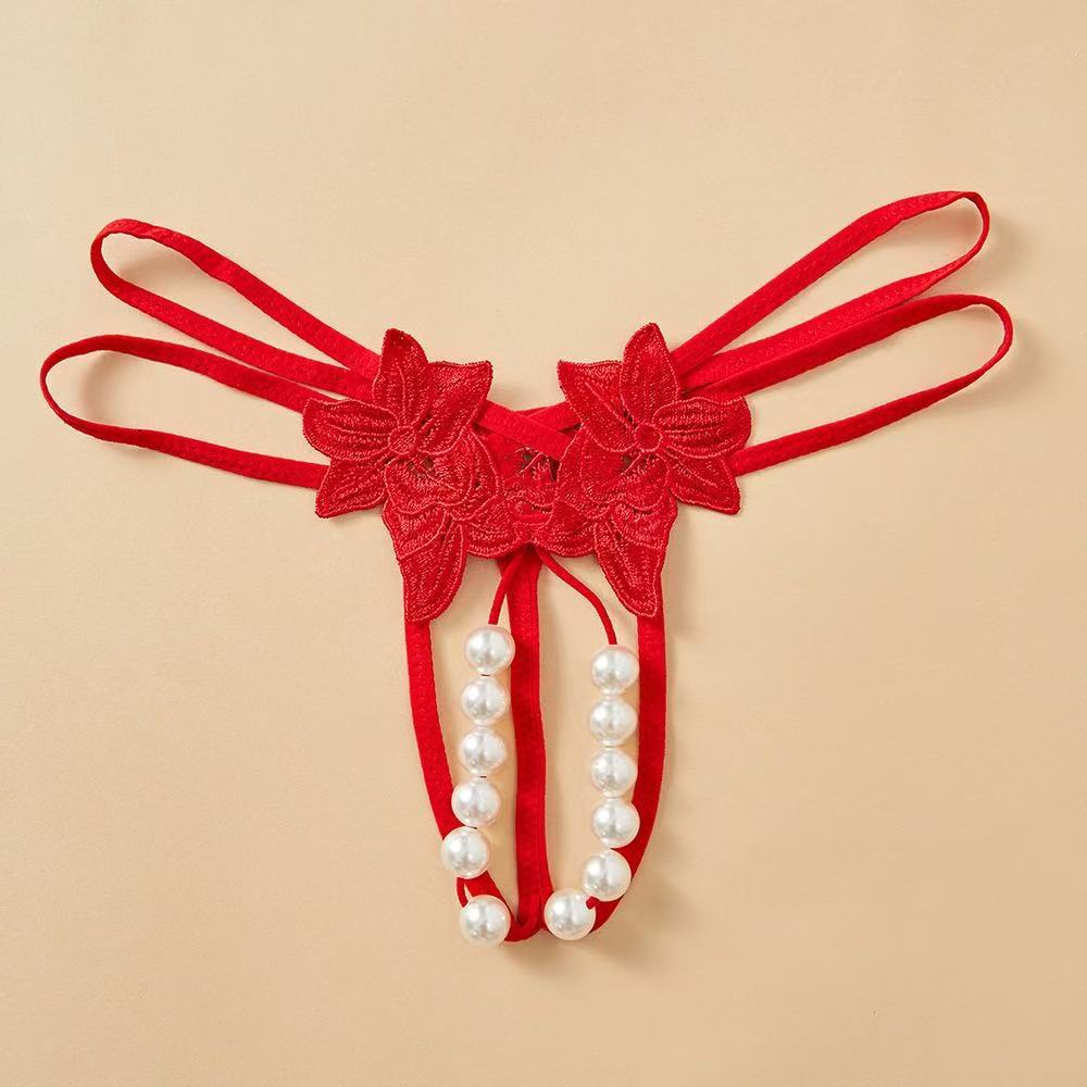 Oversized pearl detail crotchless thong